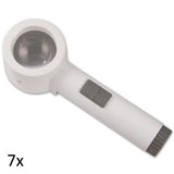 White, round lens stand magnifier with cylindrical handle grey on/off switch and grey battery port. 7x.
