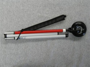 White graphite folding cane with black top, red bottom, and black wheel tip. 