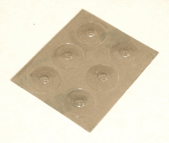 Sheet of 6 clear, round, raised Loc Dots on white background.