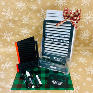 Writer's Bundle-  - Letter Guide  - Stationary Guide  - Signature Guide  - Envelope Guide  - Check Writing Guide  - Bold Writer 20  - Bold Writer 40  - Gel Pen  - Lighted Pen  - Bold Line Paper (White)  - Bold Line Notebook (White) shown against a snowflake background